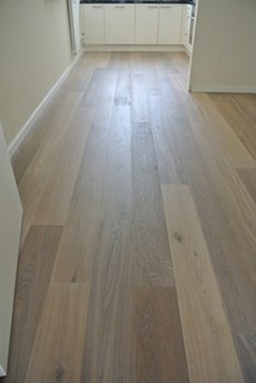 Fam. Koevoets uit Bennekom. lamelparket 14mm. Gerookt & wit geolied.