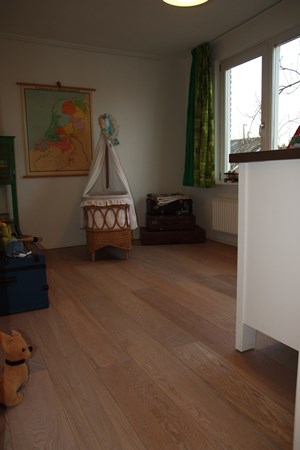 Fam. Silva uit Abcoude.
lamelparket 15x190mm. 
Wit geolied.